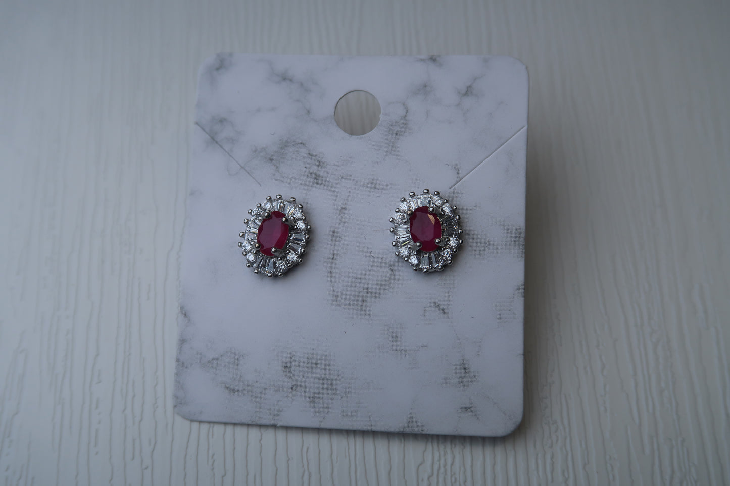 Ruby Oval-Shaped Sterling Silver Studs