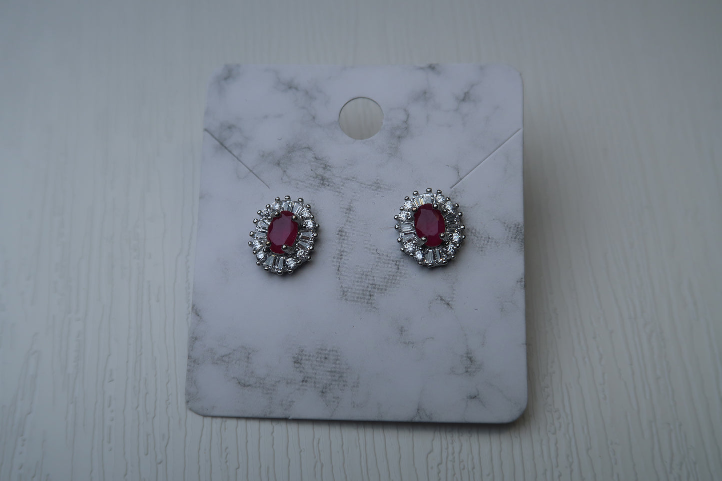 Ruby Oval-Shaped Sterling Silver Studs