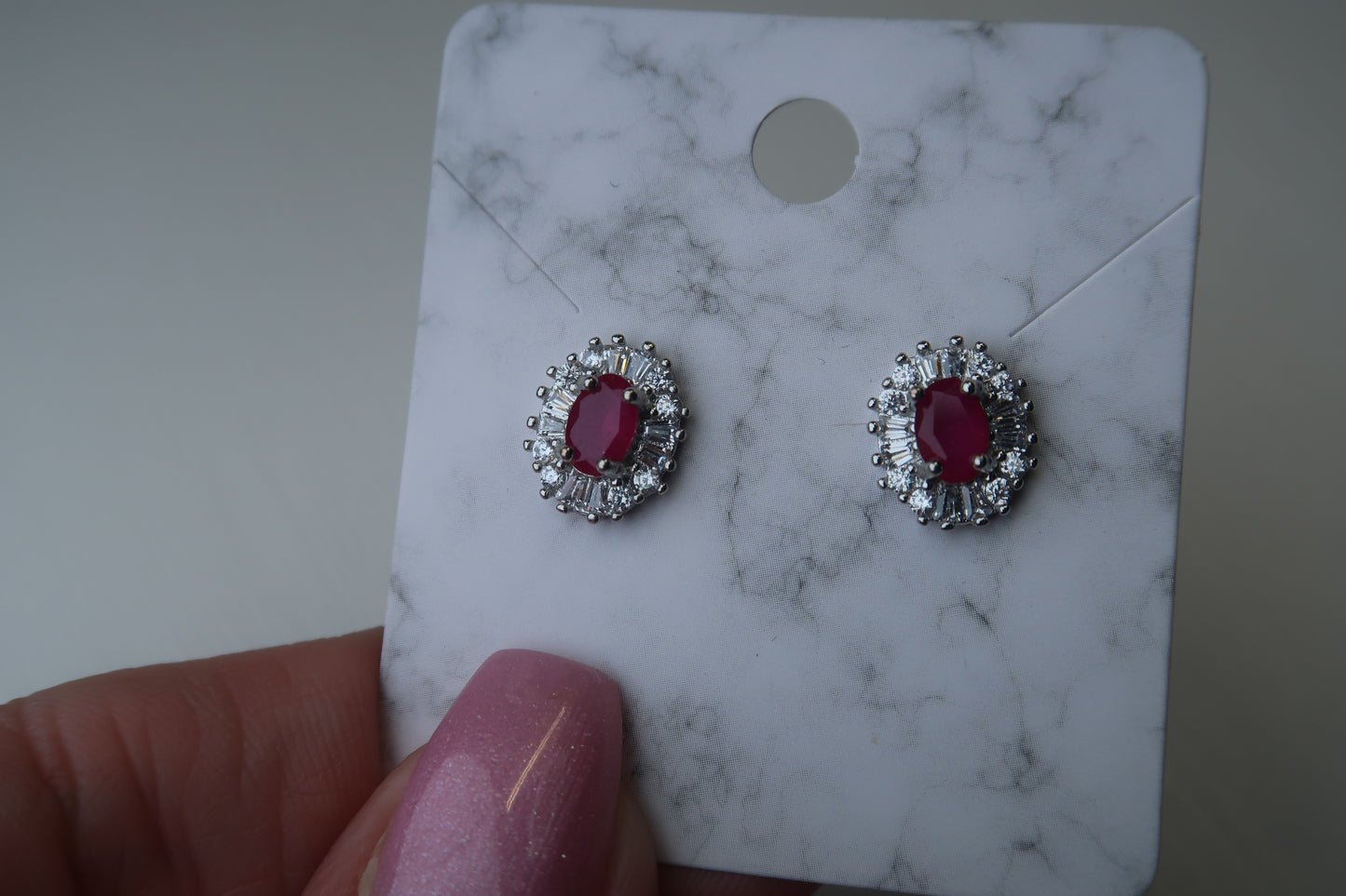 Ruby Oval-Shaped Sterling Silver Studs